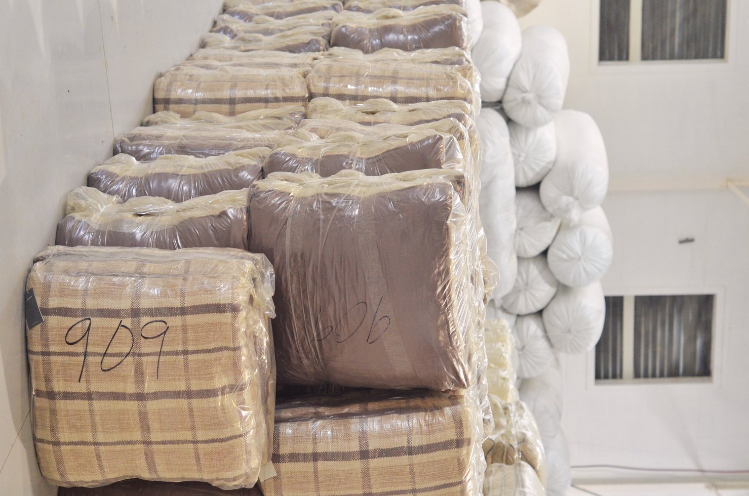 Elle Maison is a proudly South African soft furnishing manufacturer and wholesale supplier. Pictured here are individually vacuumed sealed scatter cushions in bulk packaging waiting for collection at our Stellenbosch factory.